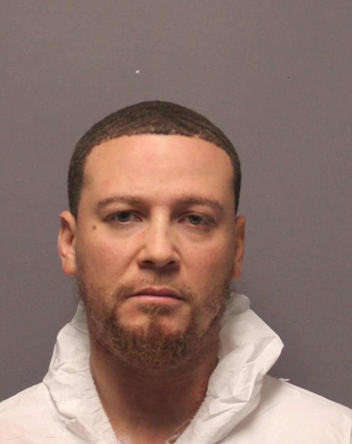 CHARGED: Michael A. Jones, 33, of 25 Queen St., Cranston, was arrested and charged following the “accidental” shooting of his four-year-old son on Halloween morning. (Photo courtesy Cranston Police)